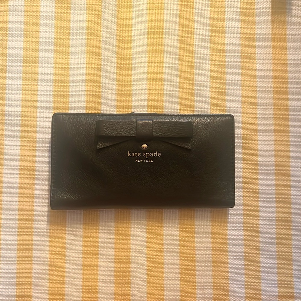 Kate Spade black leather wallet, snap closures, bow detail on front